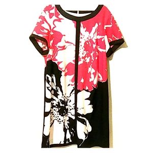 A black, red and white dress with a flower pattern